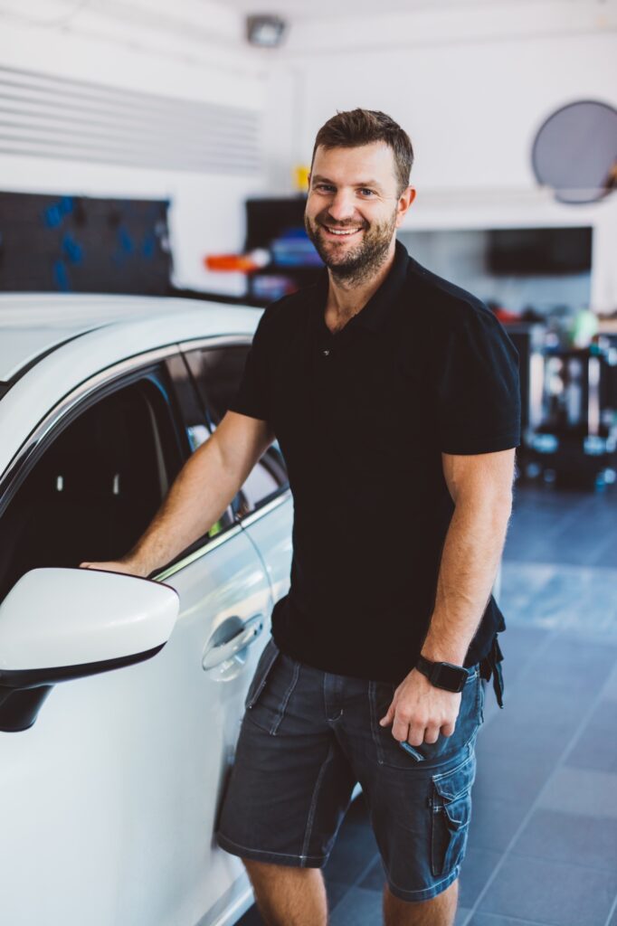 Car mechanic in workshop
